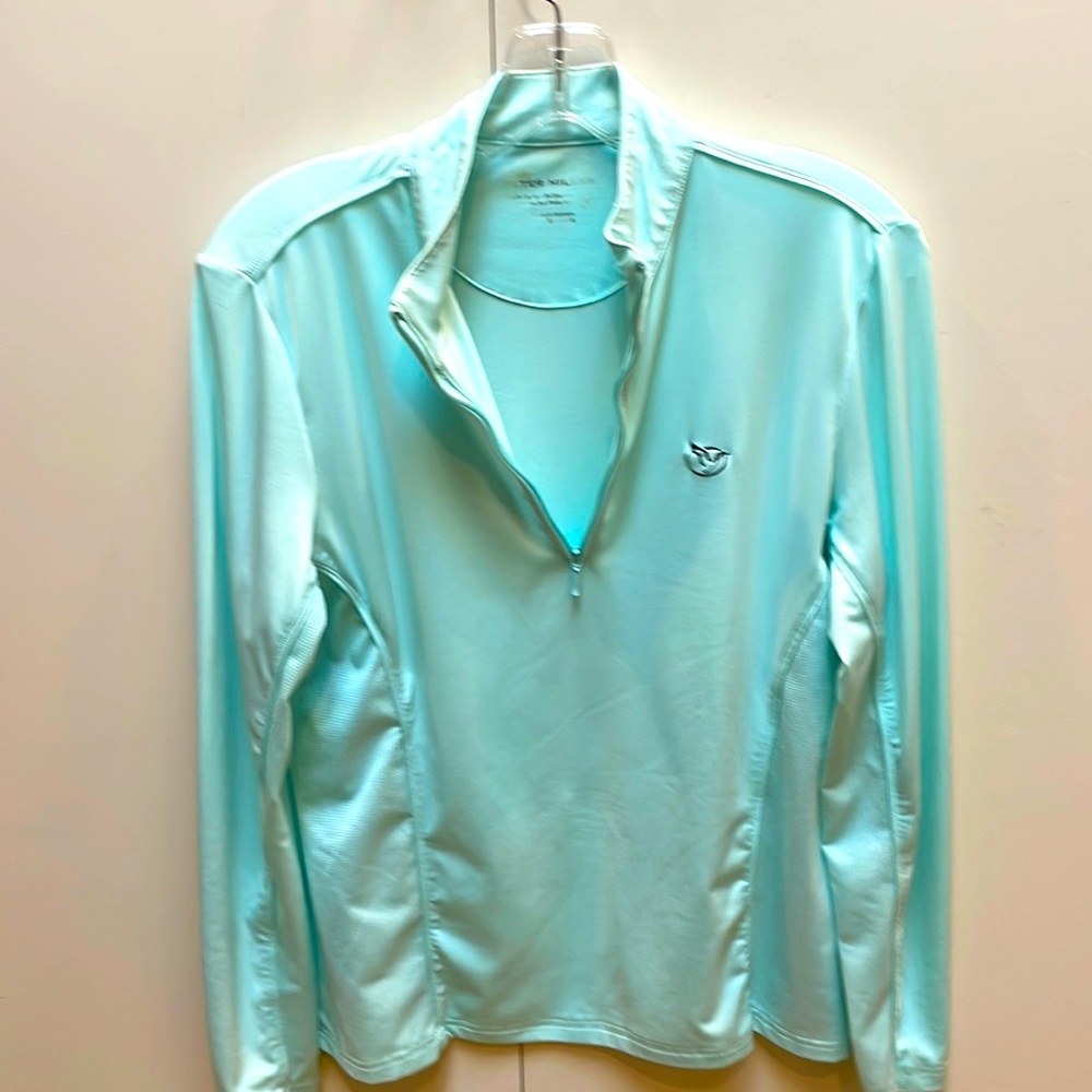 Vented sleeve long sleeve golf or tennis shirt.